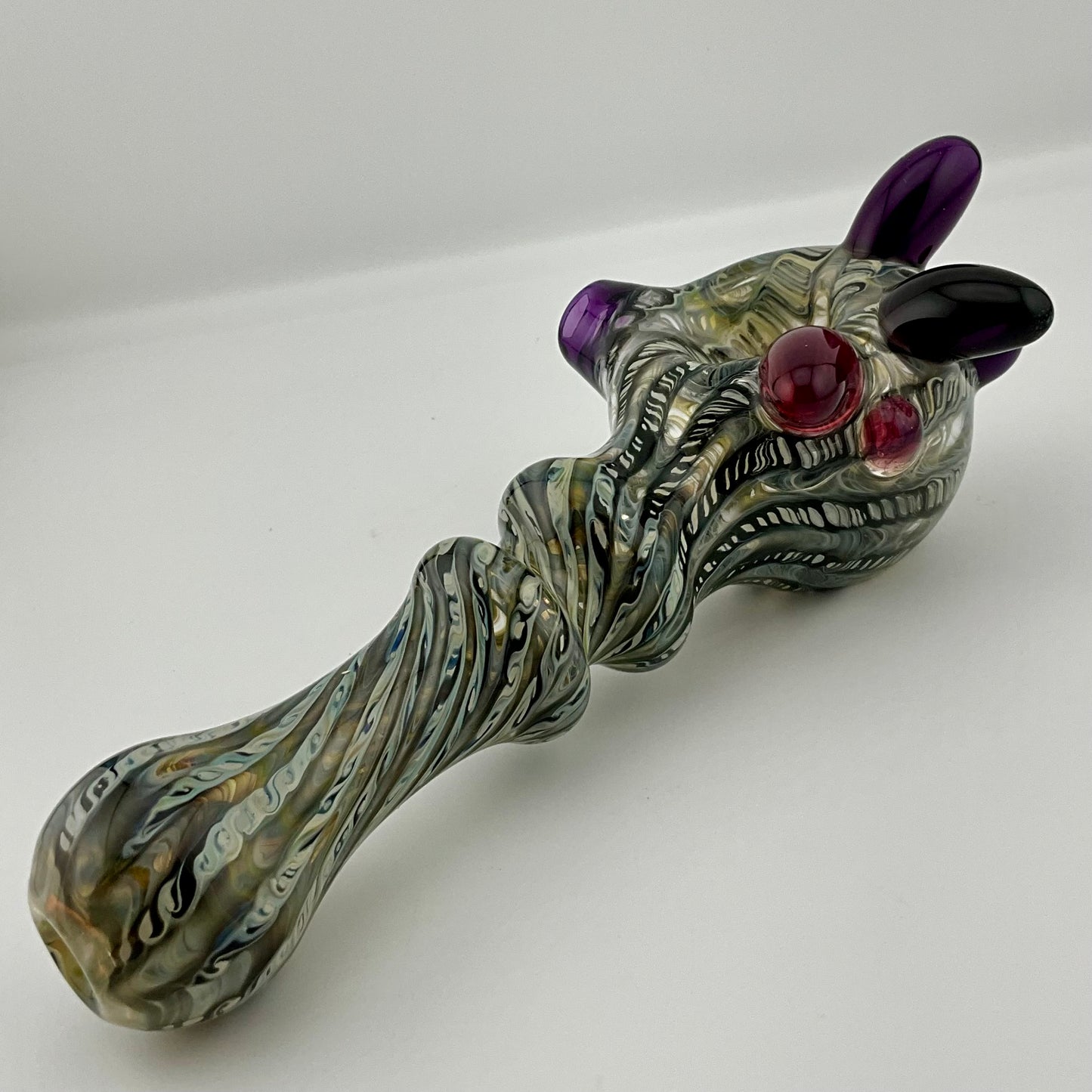 Wrap n Raked Black and Caramel Silver Fumed Spoon Pipe with light blue marbles