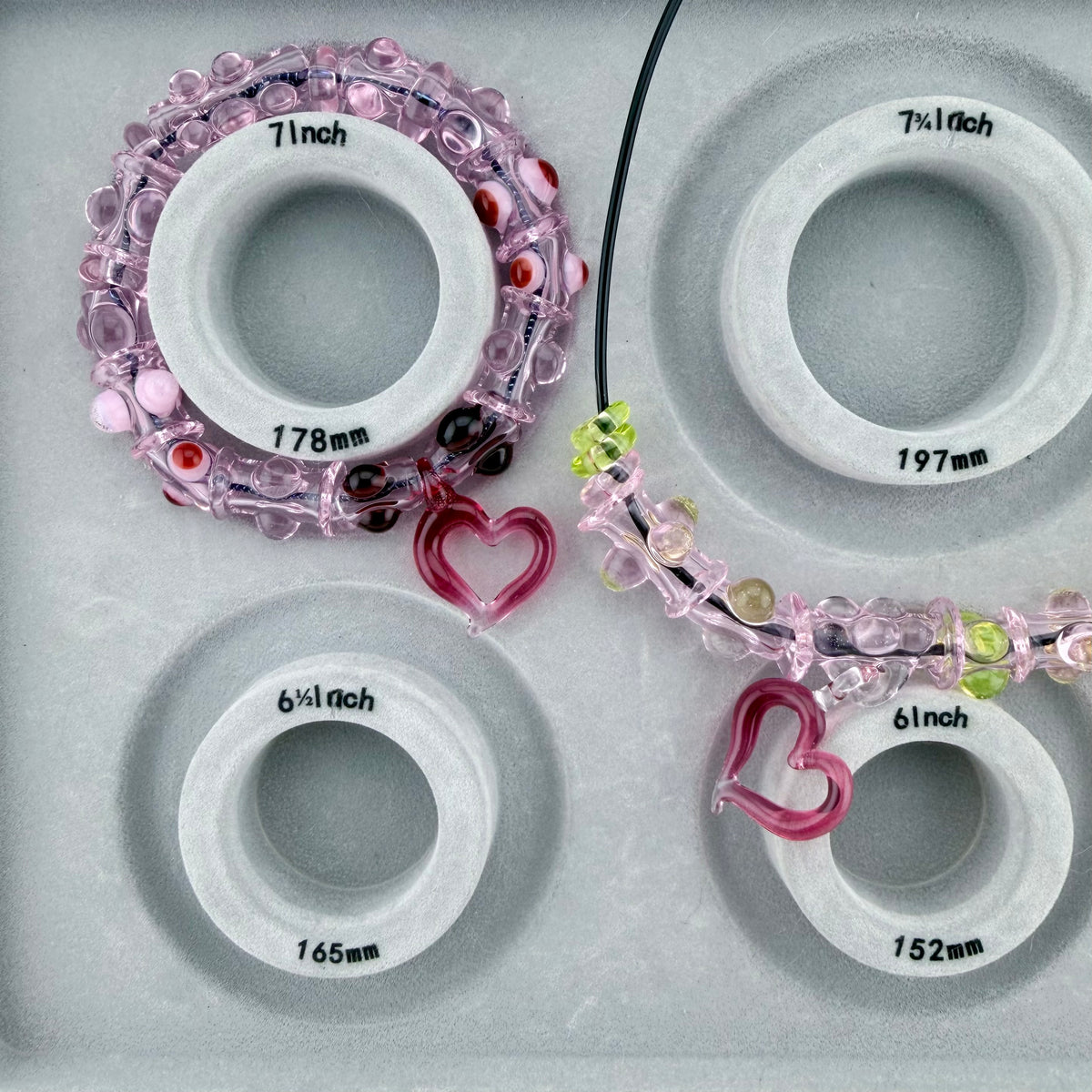 Pink Glass Stretchy Bead Bracelet with Heart Pendant 7 Inch Diameter and comes with A floating frame casefor Night Out Fashion - JeffBeckerGlass.com