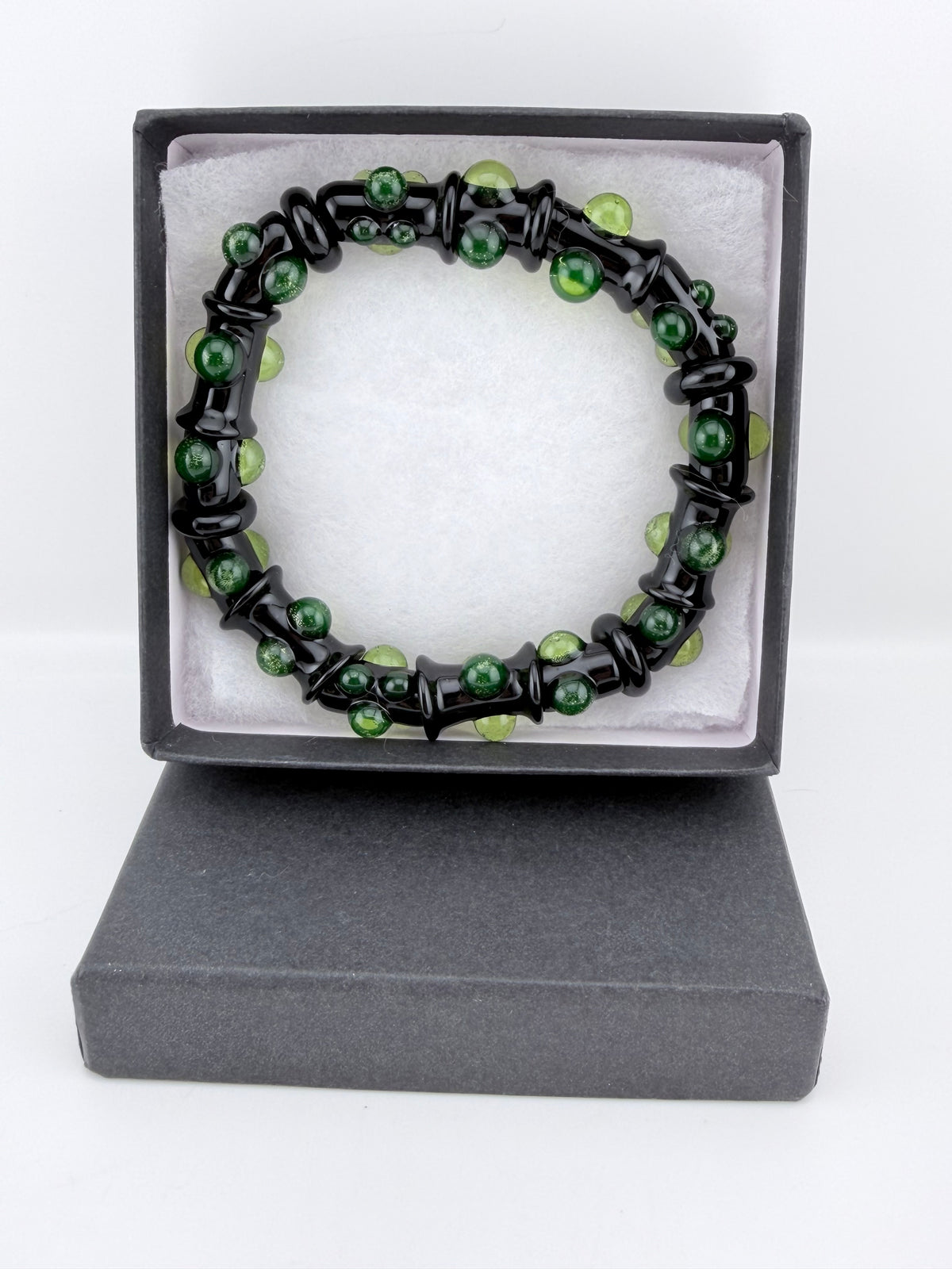 Black UV Reactive Green Dot Glass Bracelet – Glows Green Under Black Light - JeffBeckerGlass.com