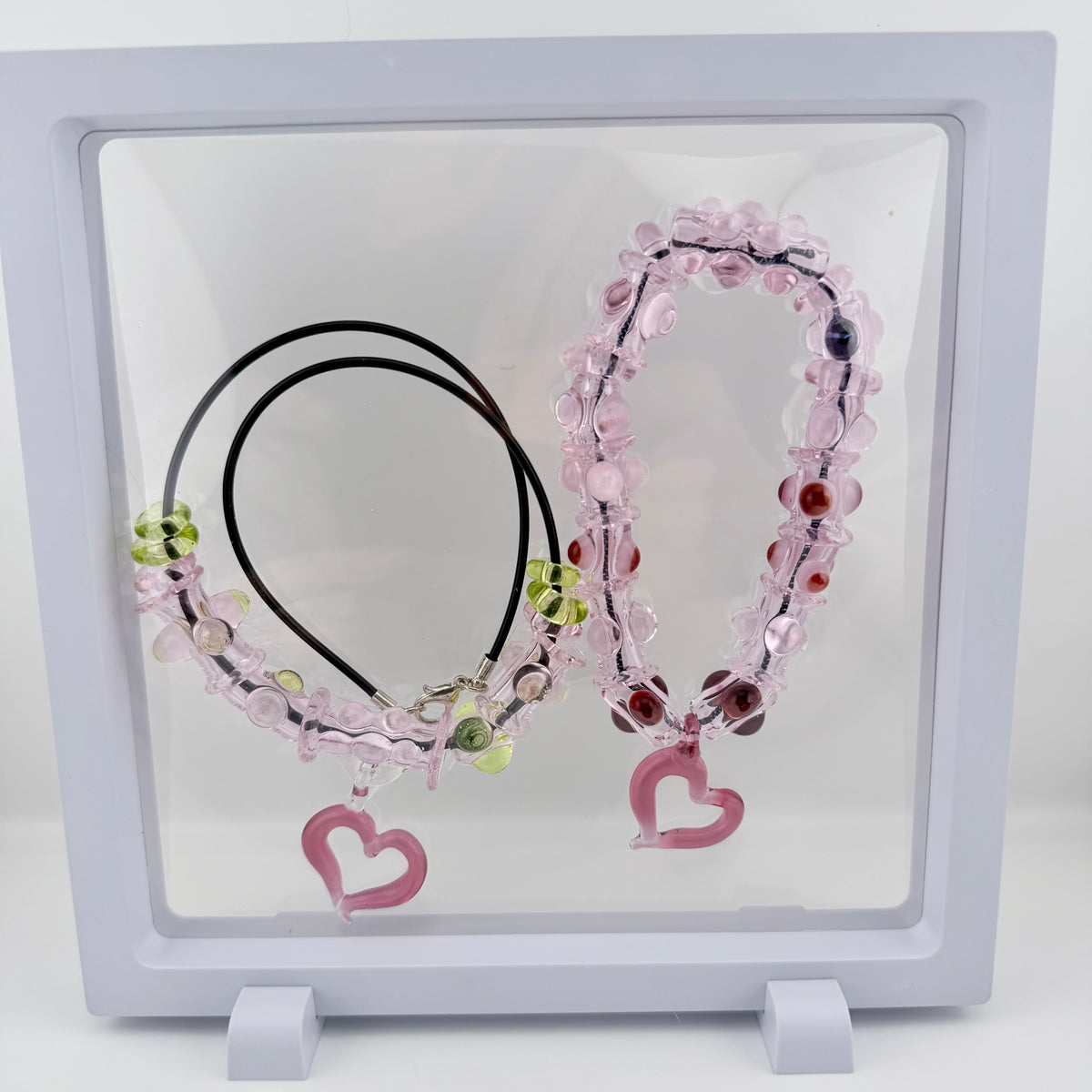 Pink Glass Stretchy Bead Bracelet with Heart Pendant 7 Inch Diameter and comes with A floating frame casefor Night Out Fashion - JeffBeckerGlass.com