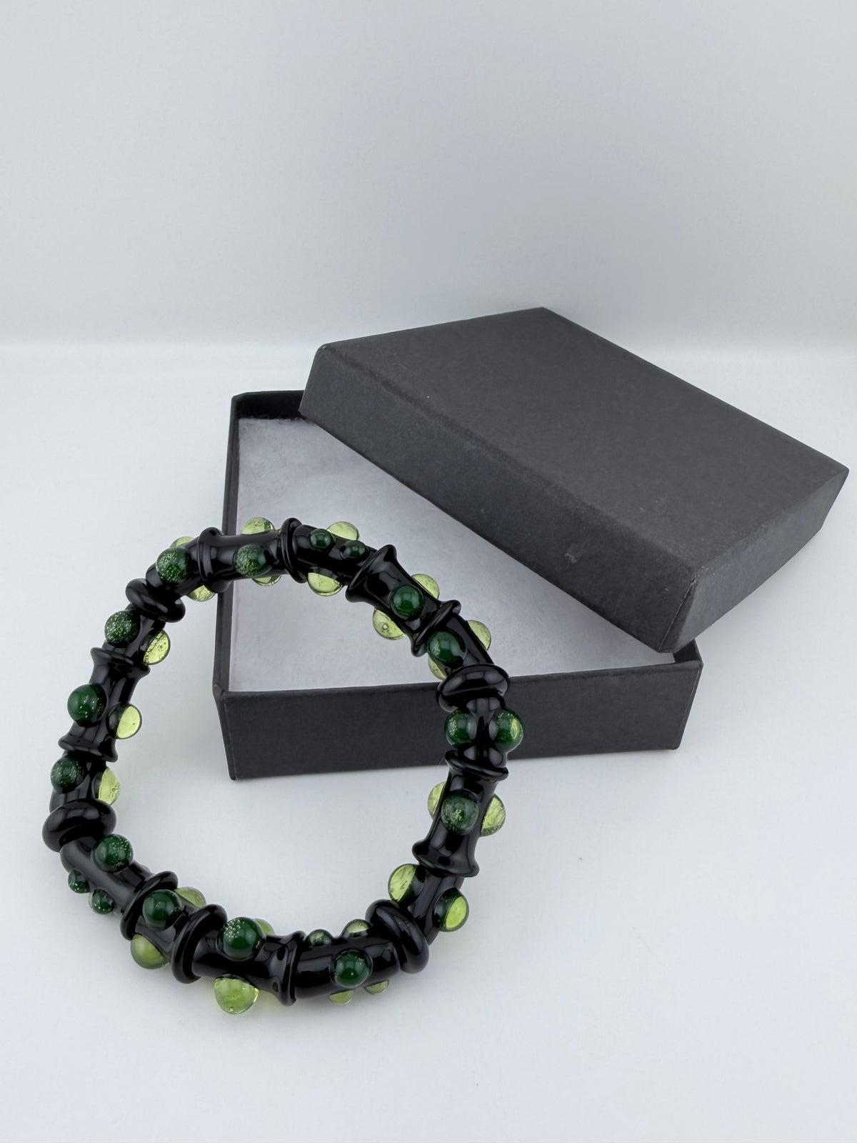 Black UV Reactive Green Dot Glass Bracelet – Glows Green Under Black Light - JeffBeckerGlass.com