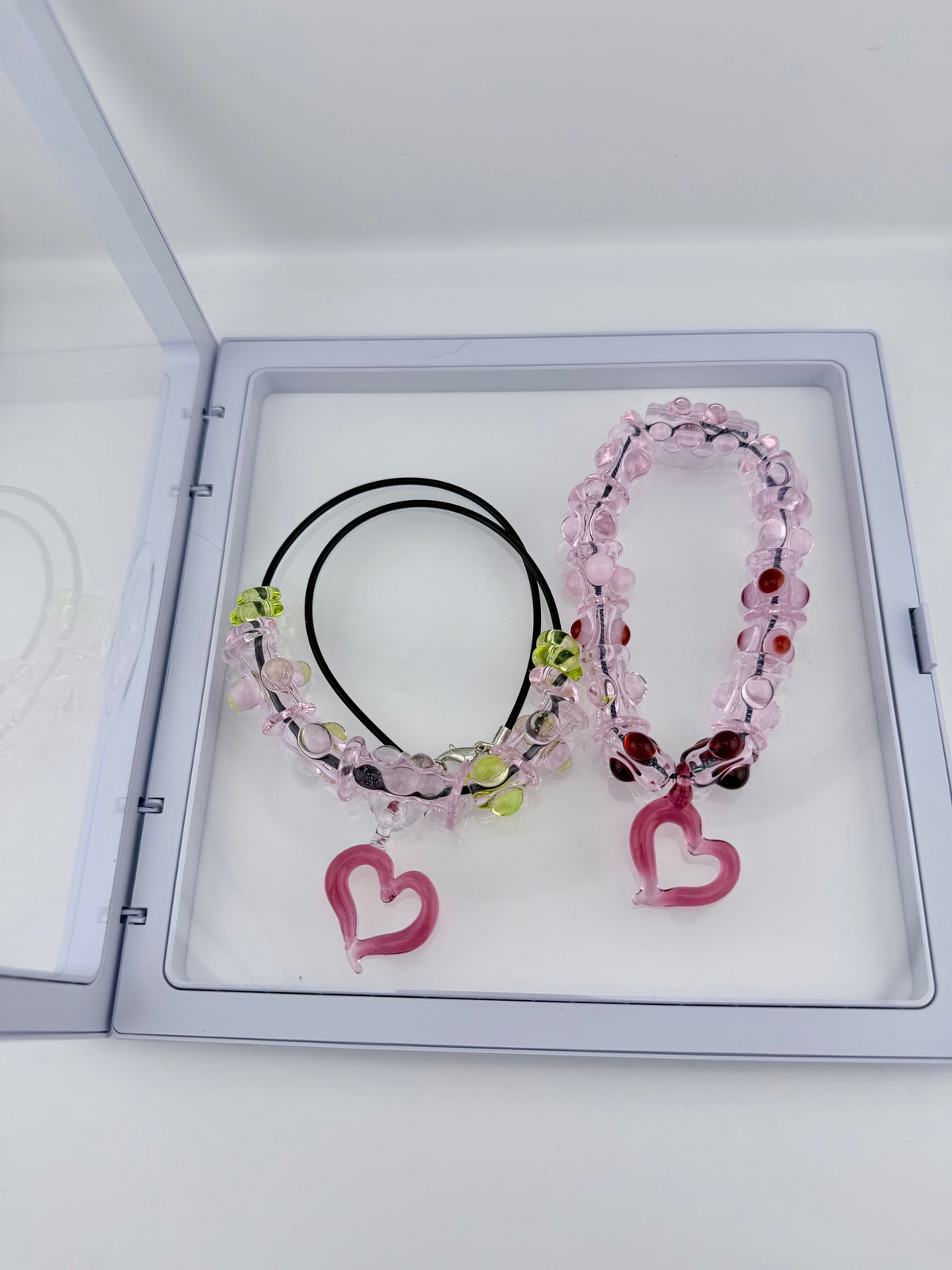 Pink Glass Stretchy Bead Bracelet with Heart Pendant 7 Inch Diameter and comes with A floating frame casefor Night Out Fashion - JeffBeckerGlass.com