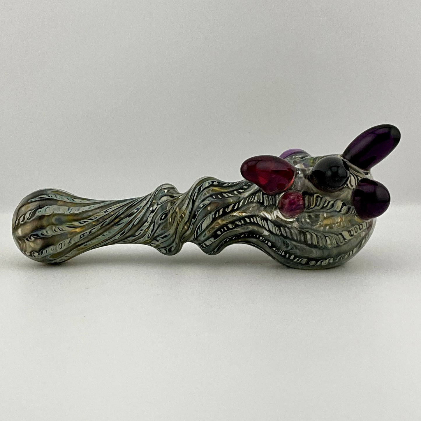 Wrap n Raked Black and Caramel Silver Fumed Spoon Pipe with light blue marbles
