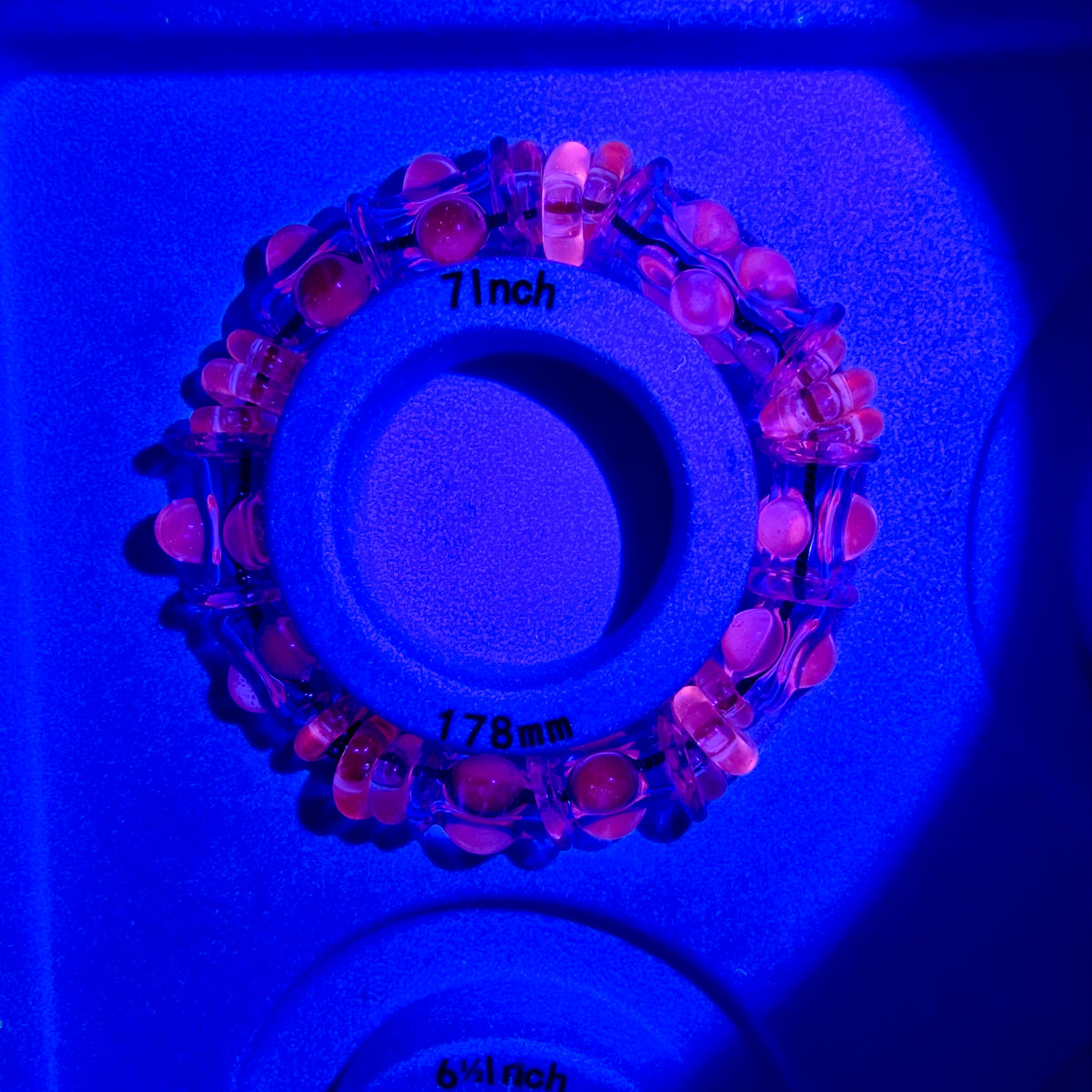 Stretchy Pink Glass Bracelet with dots that Glow Bright Pink Under BlackLight - JeffBeckerGlass.com