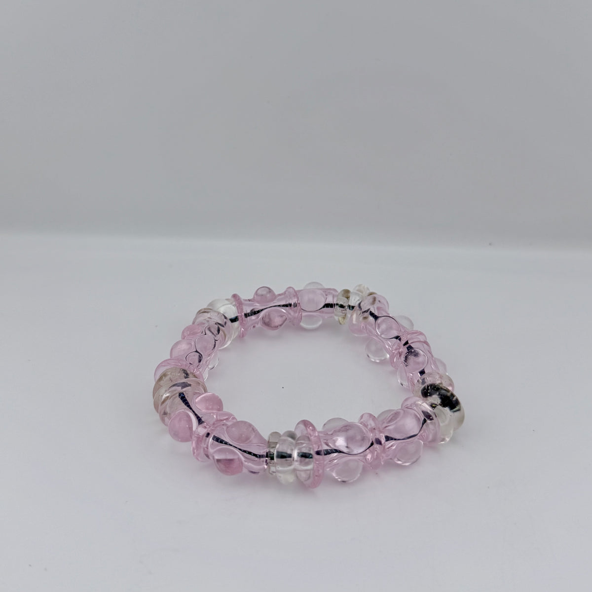 Stretchy Pink Glass Bracelet with dots that Glow Bright Pink Under BlackLight - JeffBeckerGlass.com
