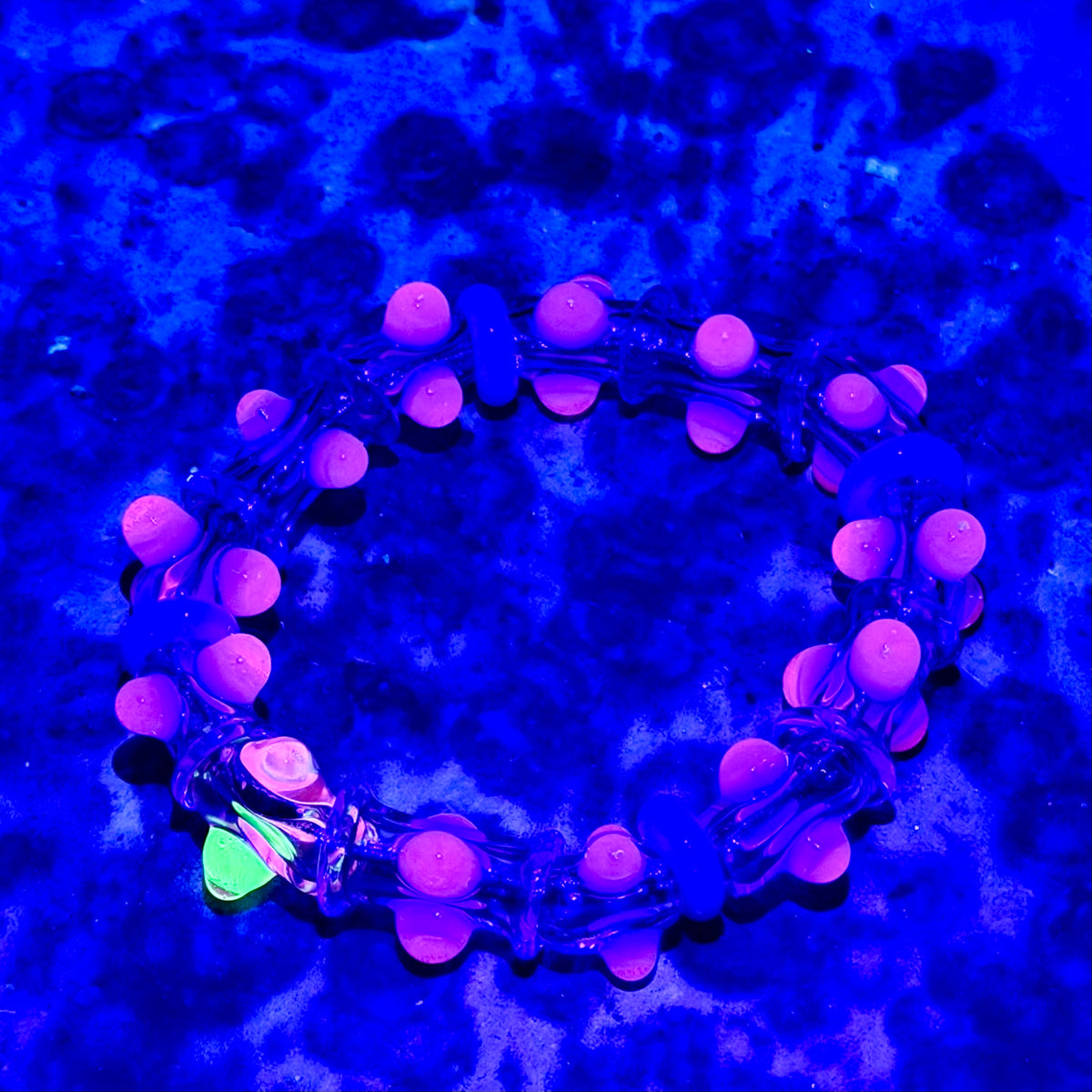 Stretchy Pink Glass Bracelet that Glow Bright Pink Under BlackLight - JeffBeckerGlass.com