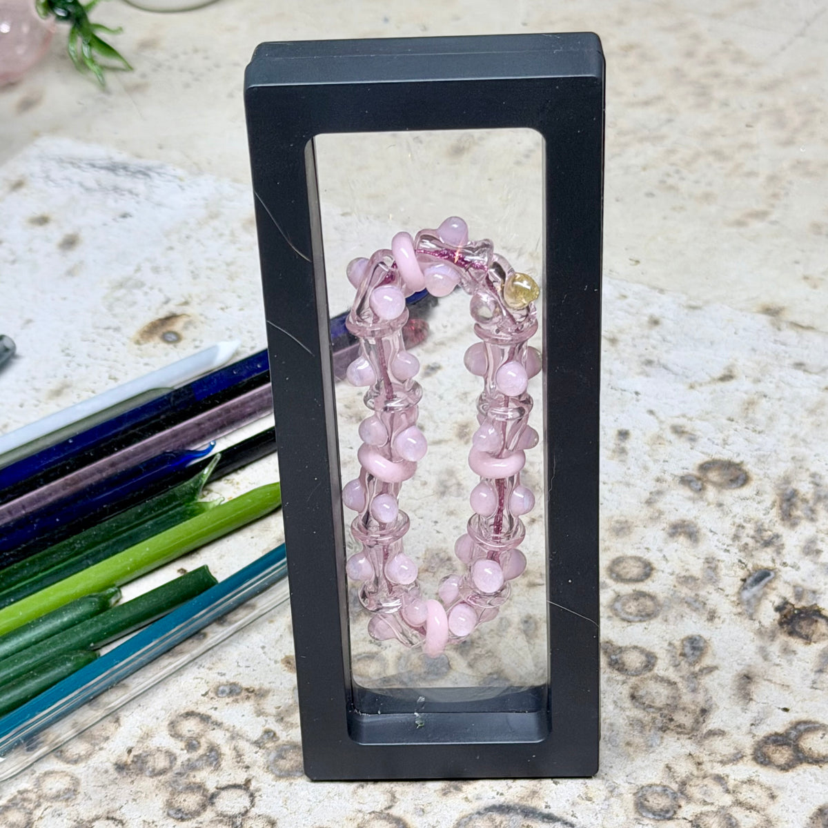 Stretchy Pink Glass Bracelet that Glow Bright Pink Under BlackLight - JeffBeckerGlass.com