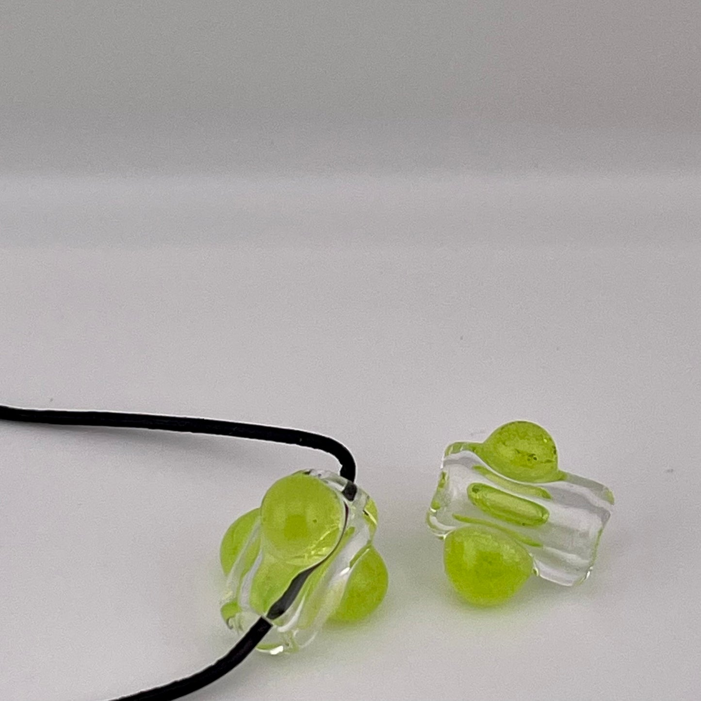 2 Clear beads with Slime Green marbles