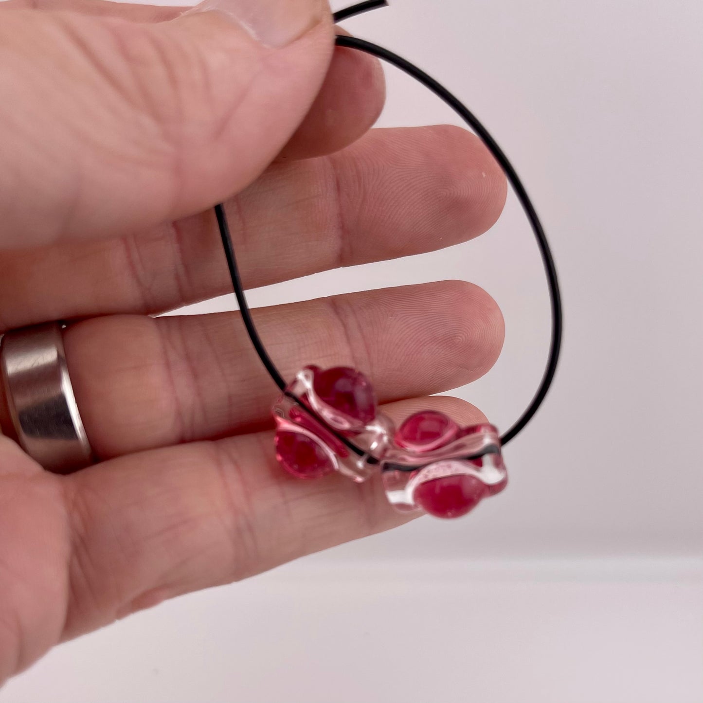 2 Clear beads with Gold Ruby marbles