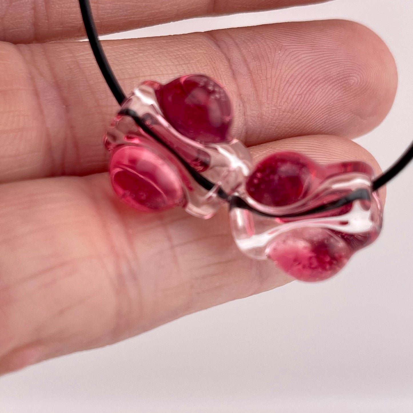 2 Clear beads with Gold Ruby marbles