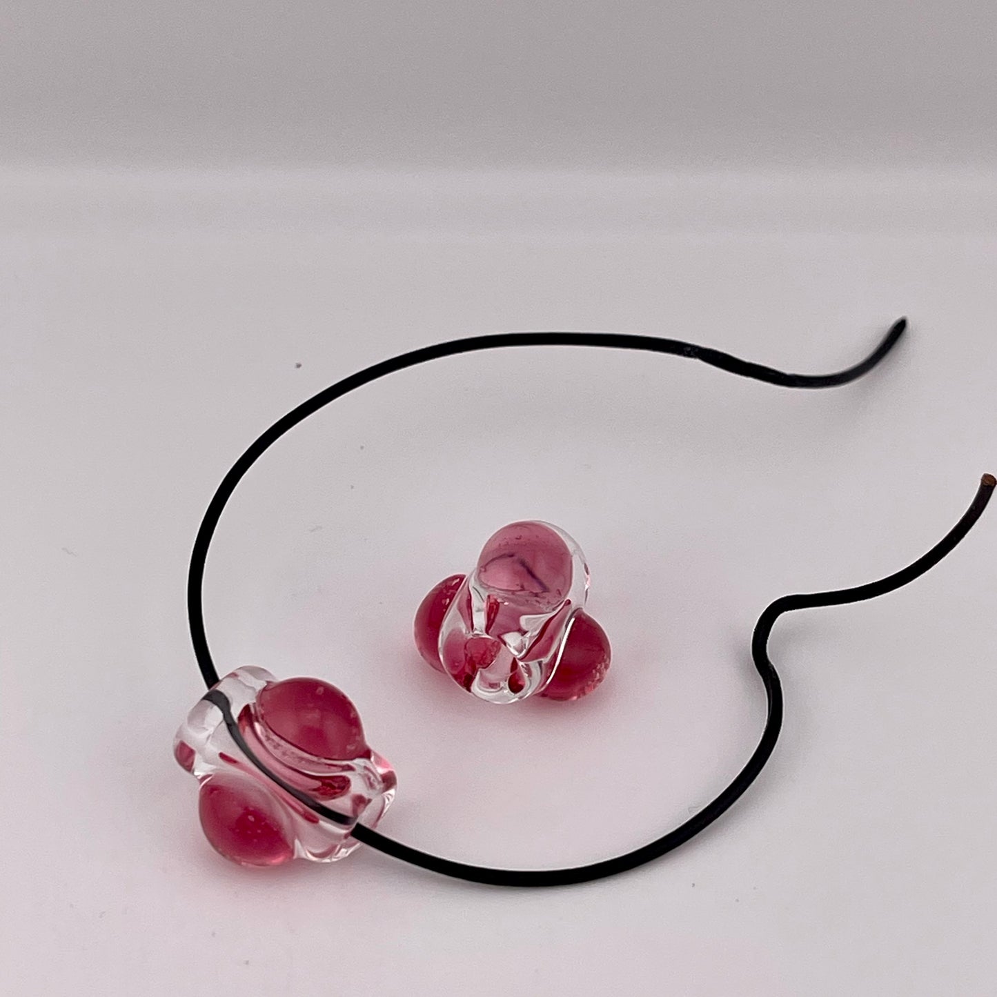 2 Clear beads with Gold Ruby marbles