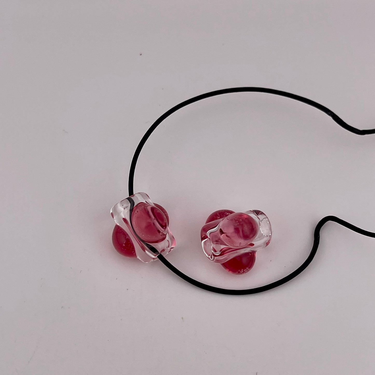 2 Clear beads with Gold Ruby marbles
