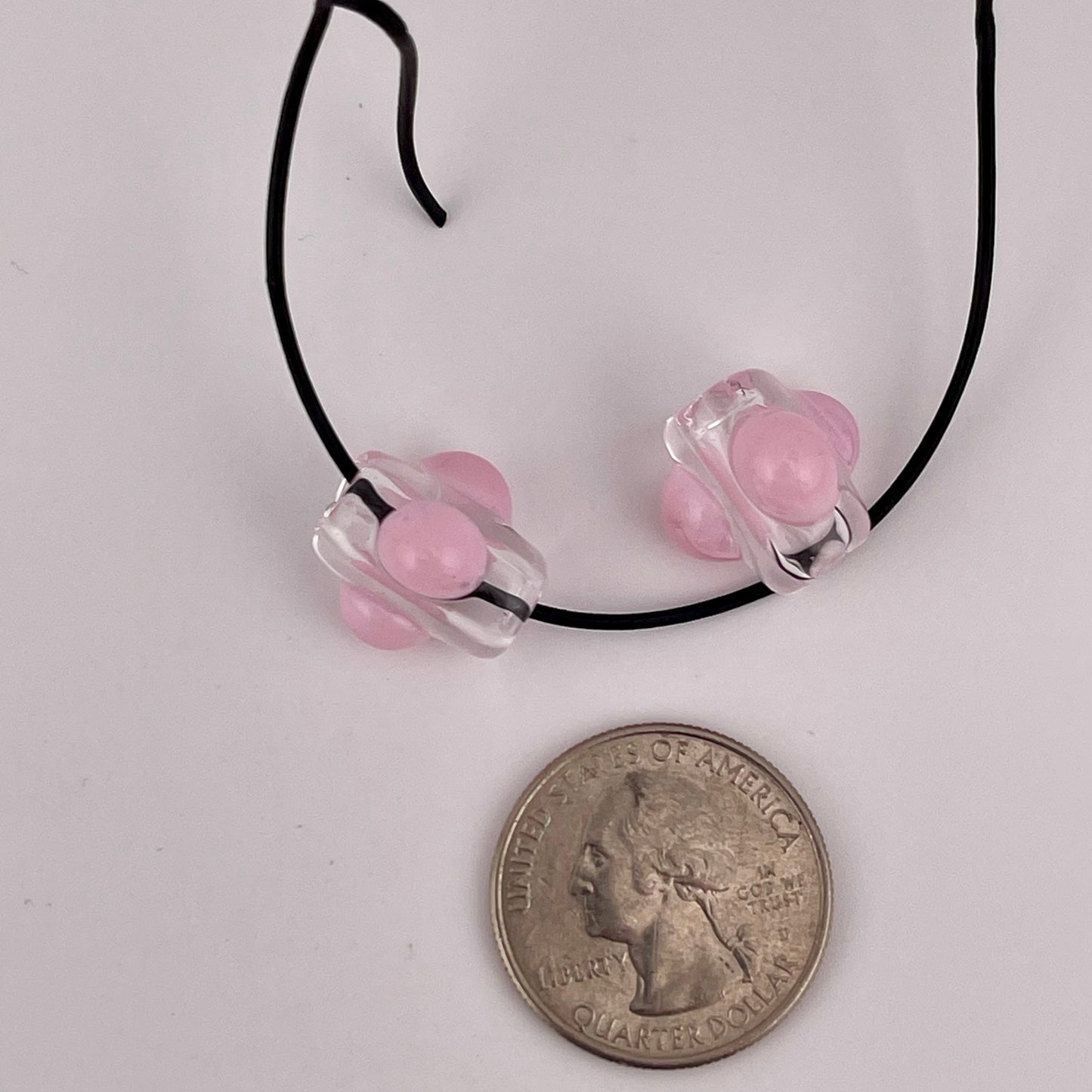 2 Clear beads with Cadillac Pink marbles