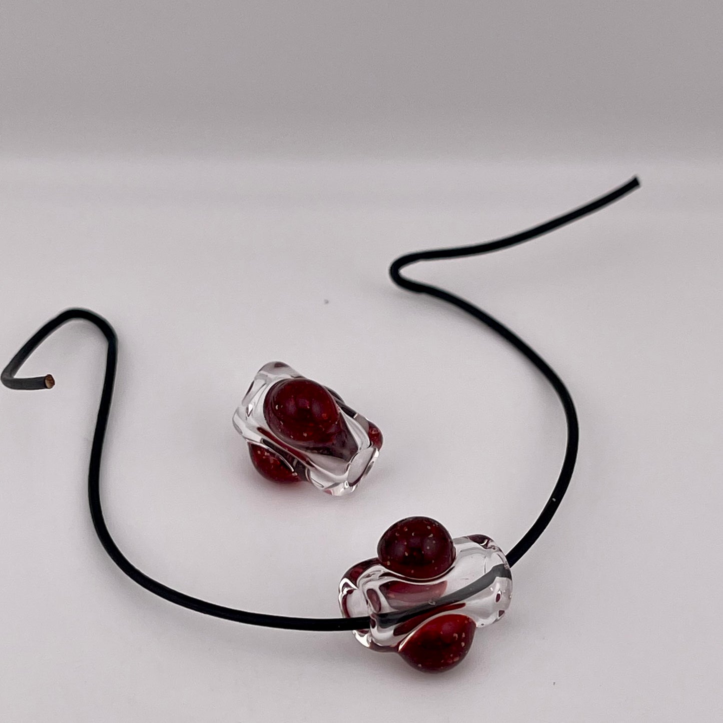 2 Clear beads with Blizzard Red marbles