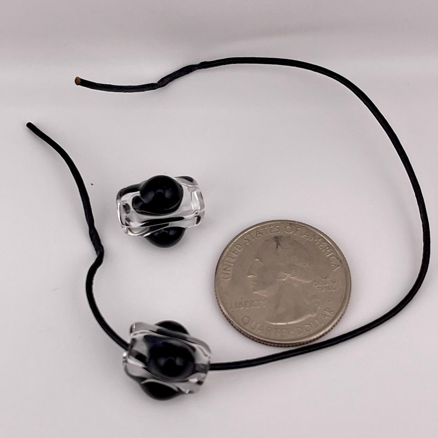 2 Clear beads with Black marbles - JeffBeckerGlass.com