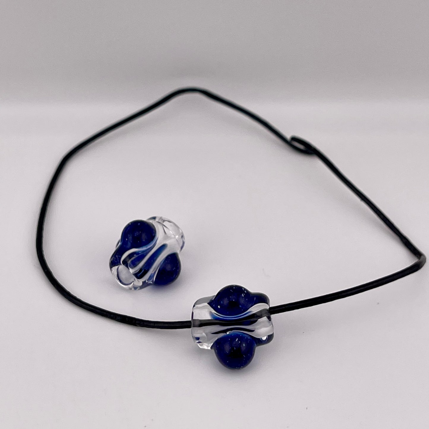 2 Clear beads with Blizzard Blue marbles