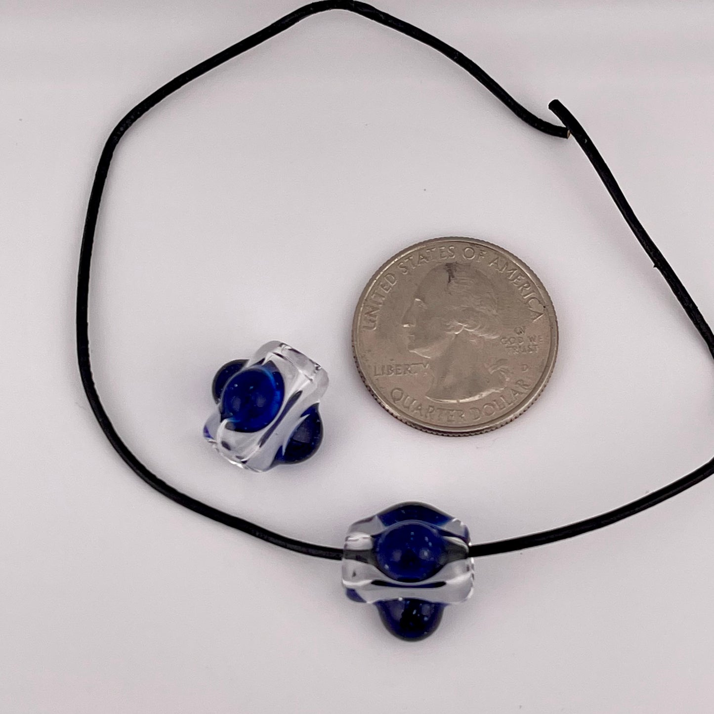 2 Clear beads with Blizzard Blue marbles