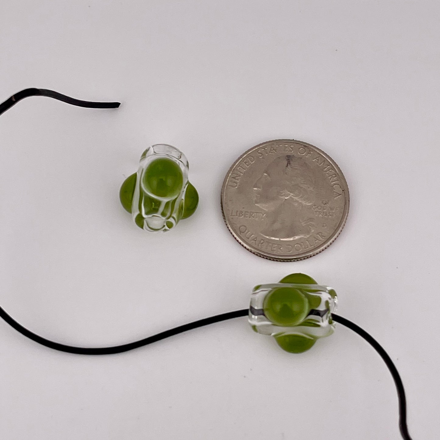 2 Clear beads with Timber Green marbles
