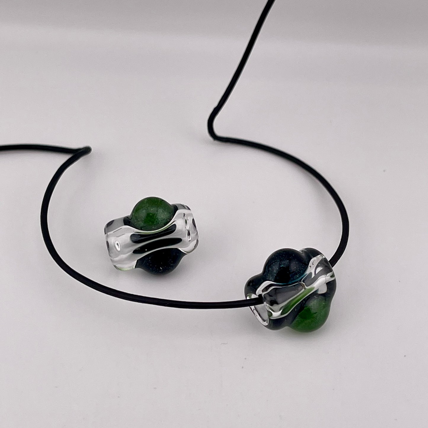 2 Clear beads with Sparkly Green and Blue marbles