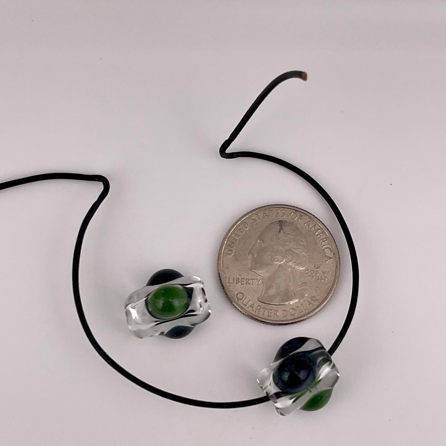 2 Clear beads with Sparkly Green and Blue marbles