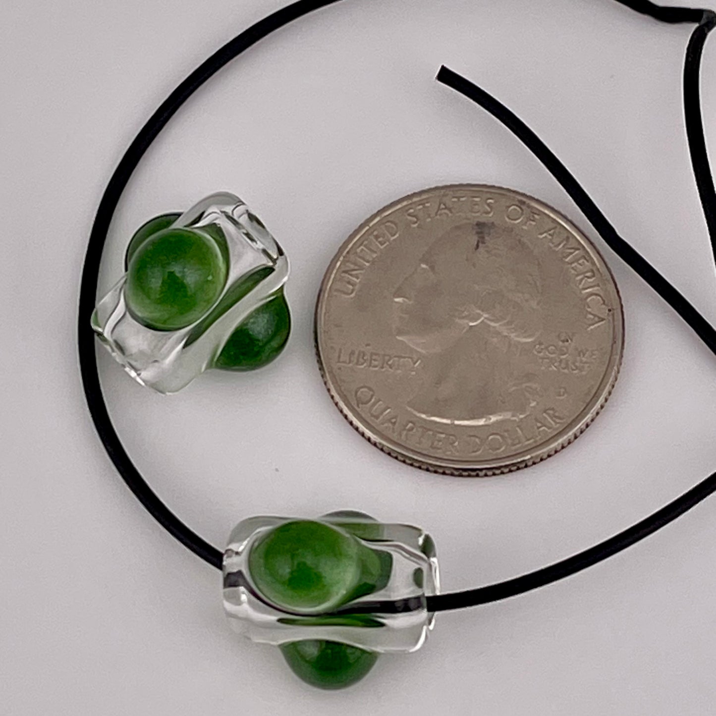 2 Clear beads with Sparkly Green marbles - JeffBeckerGlass.com