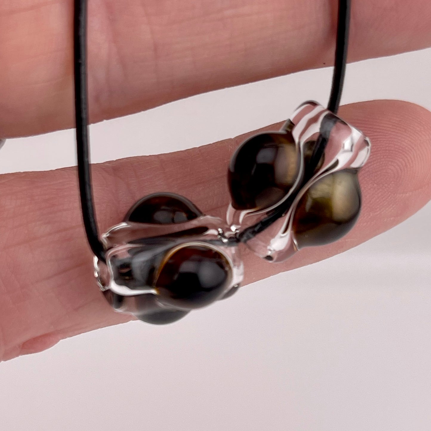 2 Clear beads with Gold Bronze marbles
