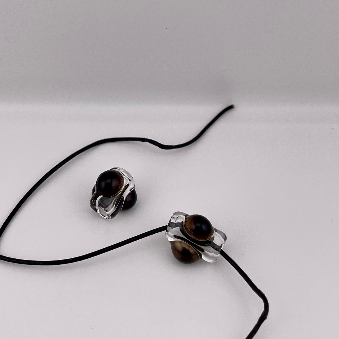 2 Clear beads with Gold Bronze marbles