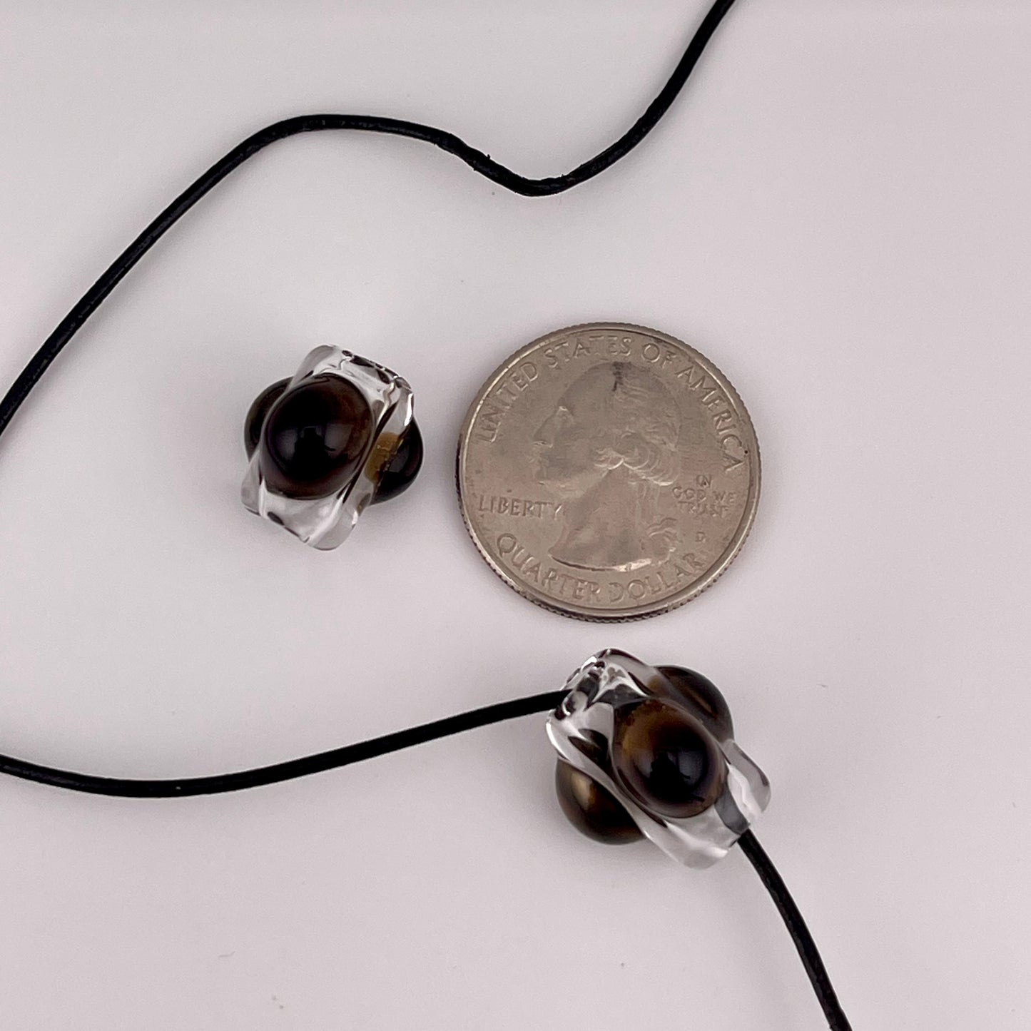 2 Clear beads with Gold Bronze marbles