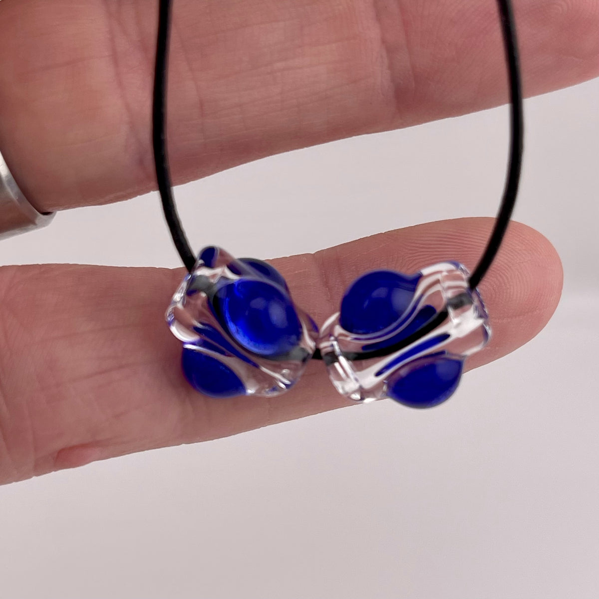 2 Clear beads with Blue marbles - JeffBeckerGlass.com