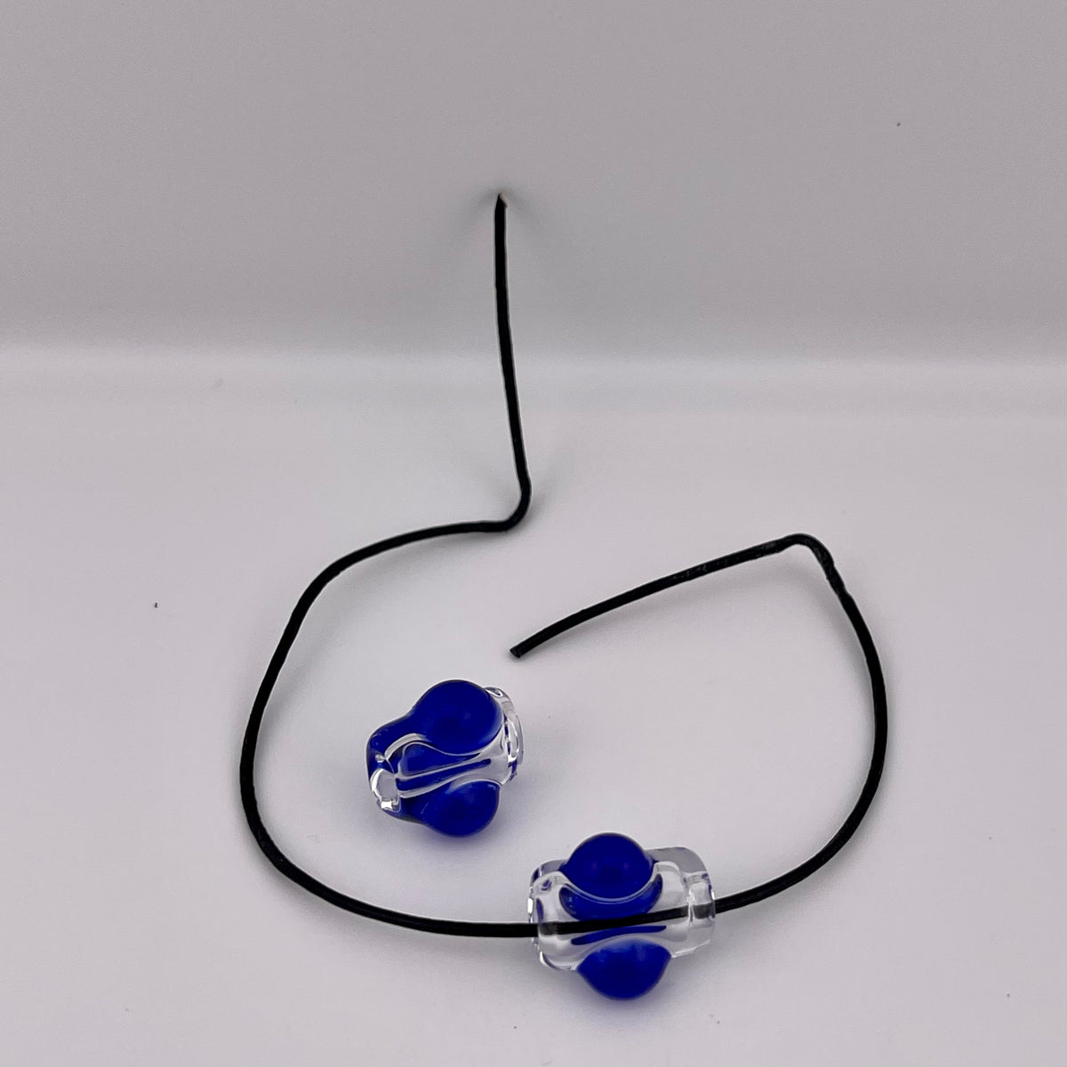2 Clear beads with Blue marbles - JeffBeckerGlass.com