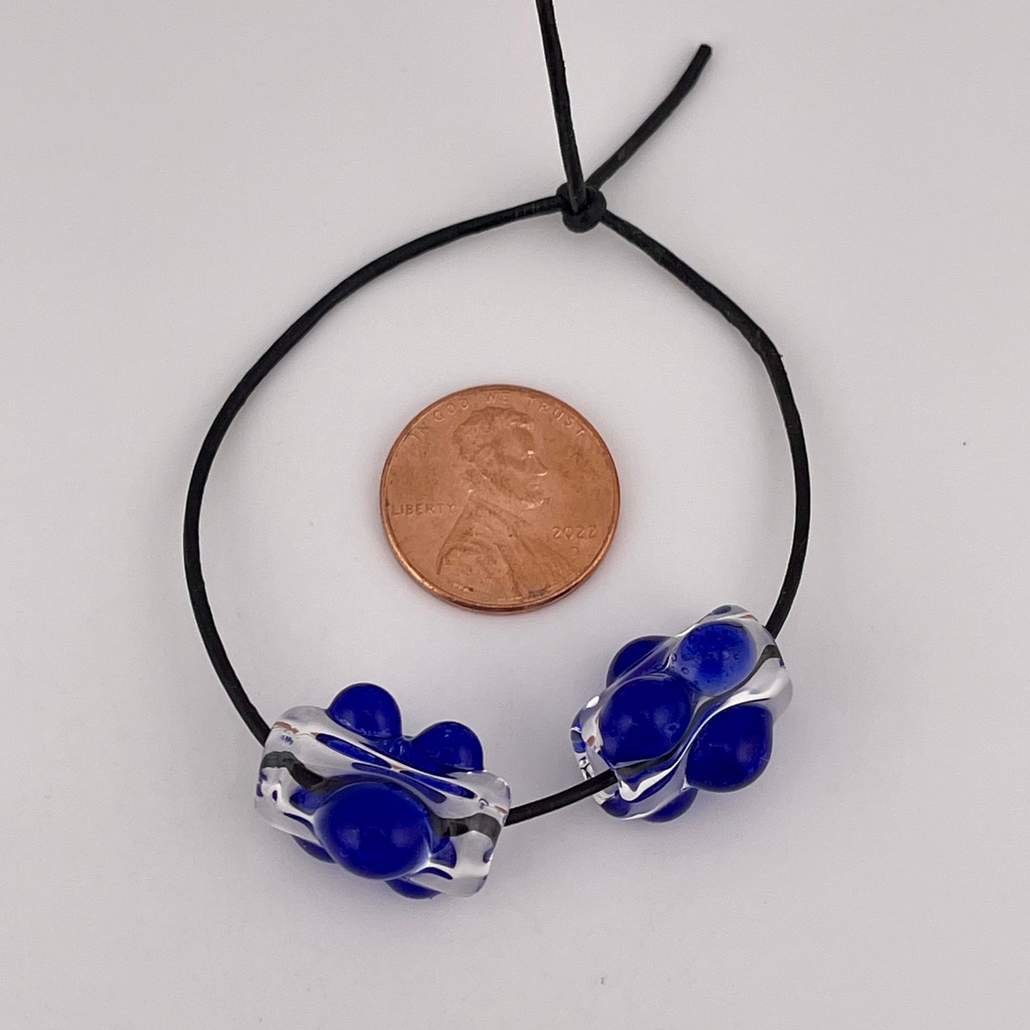Clear Glass Barrel Bead with Blue Marbles