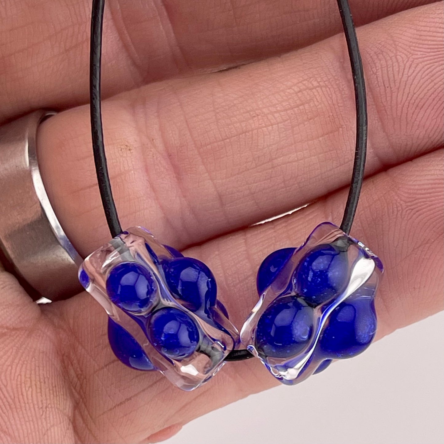 Clear Glass Barrel Bead with Blue Marbles