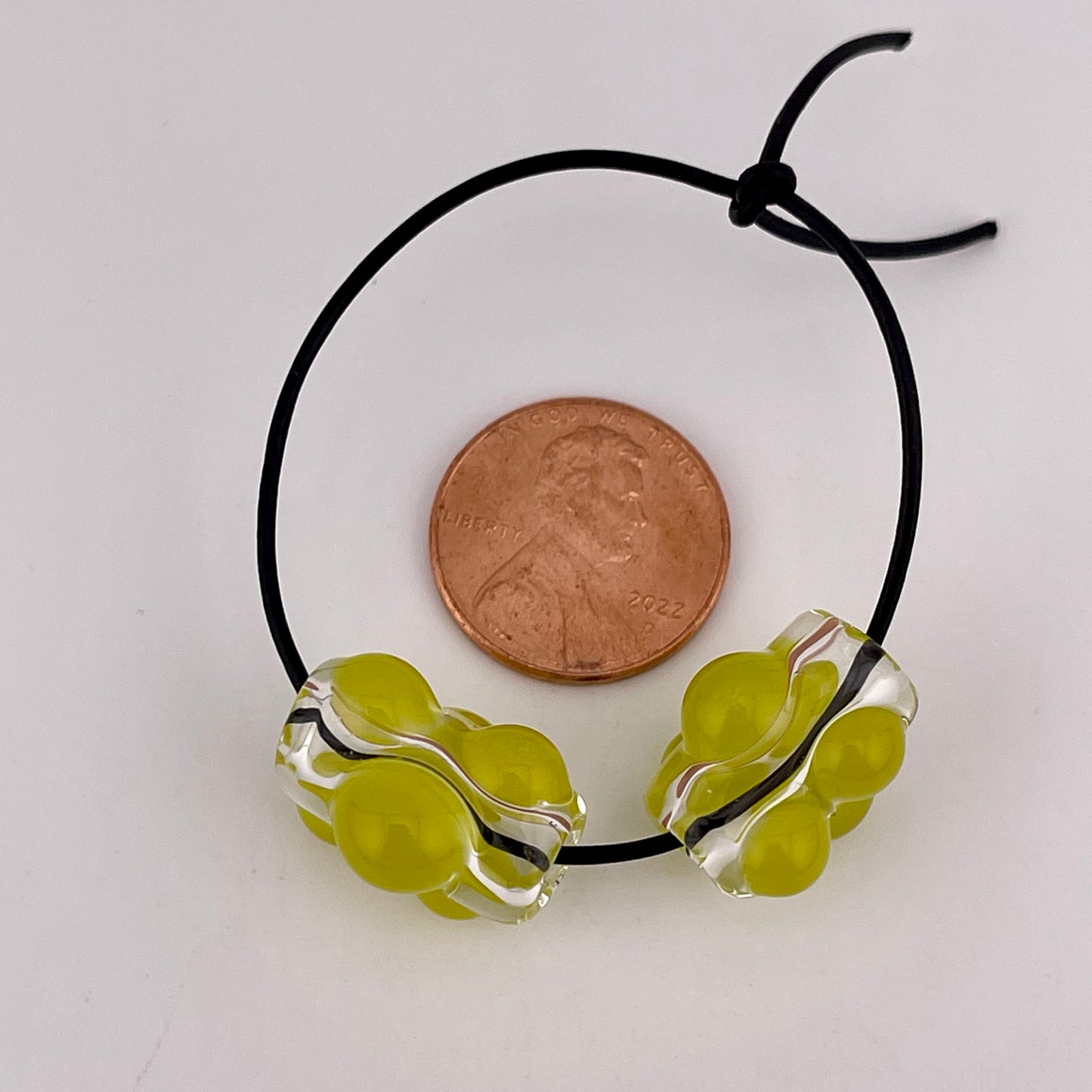 Clear Glass Barrel Bead with Yellow Green Marbles