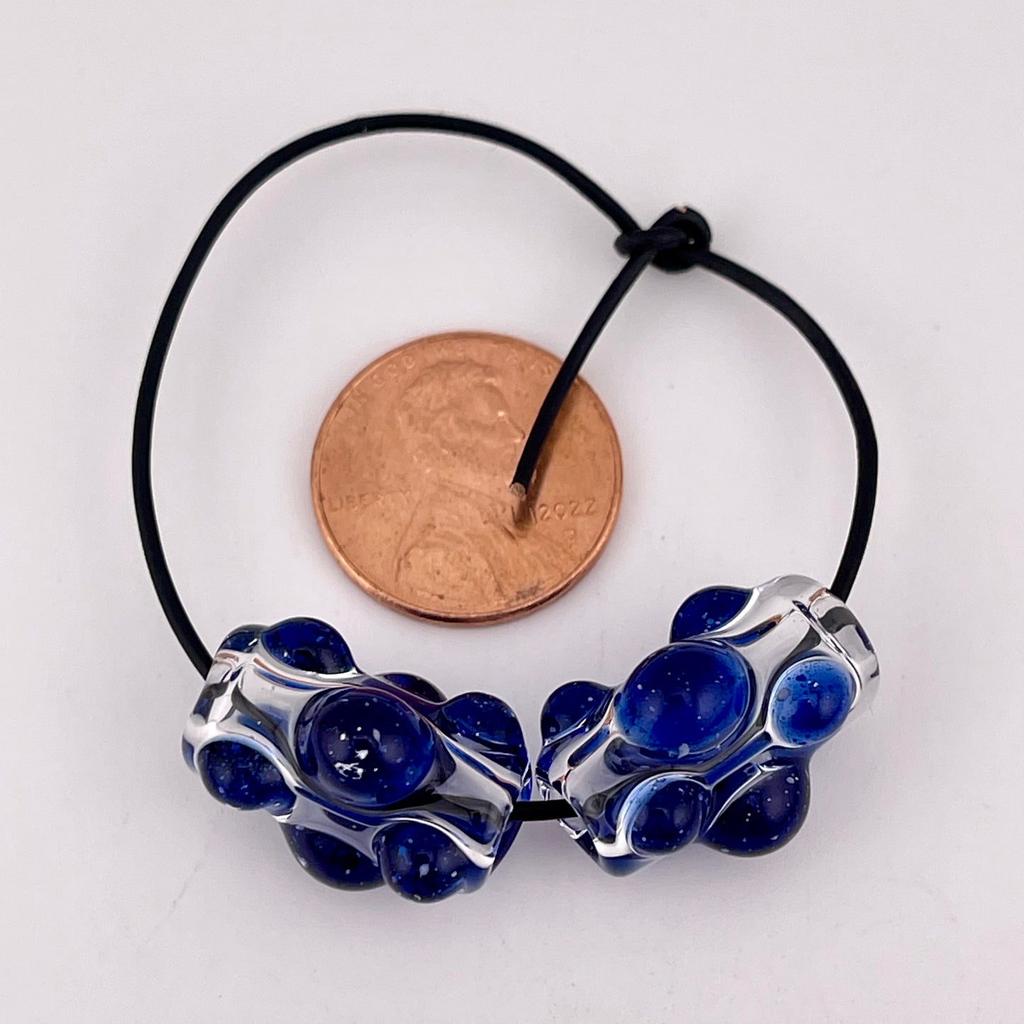 Clear Glass Barrel Bead with Blizzard Blue Marbles