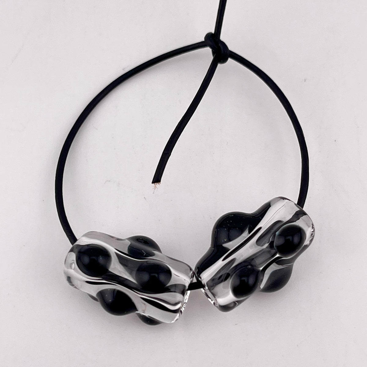 Clear Glass Barrel Bead with Black Marbles - JeffBeckerGlass.com