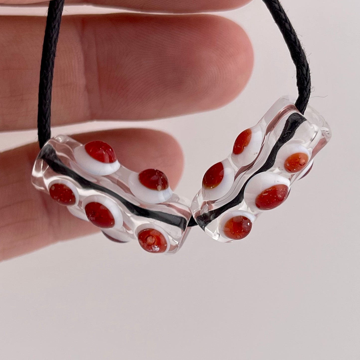2 Clear Glass Barrel Bead with Blizzard Red over White Marbles (Copy)