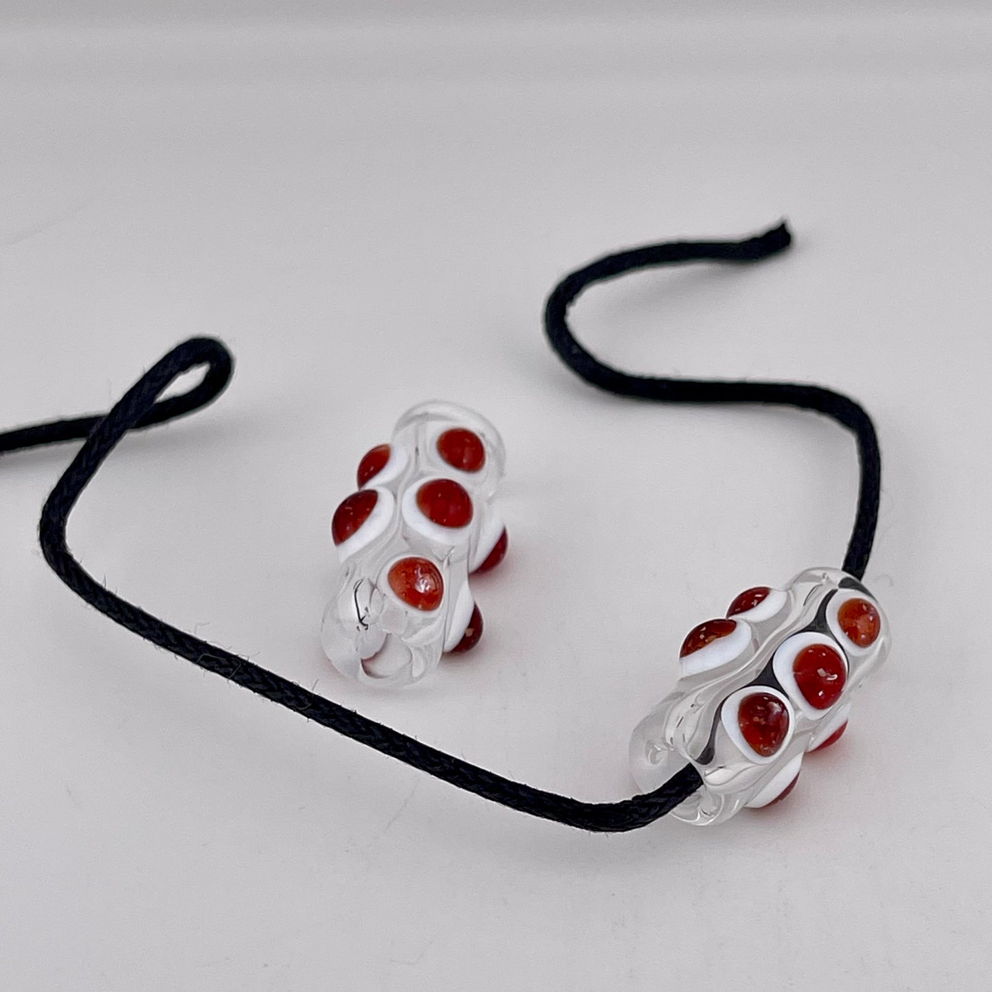 2 Clear Glass Barrel Bead with Blizzard Red over White Marbles (Copy) - JeffBeckerGlass.com