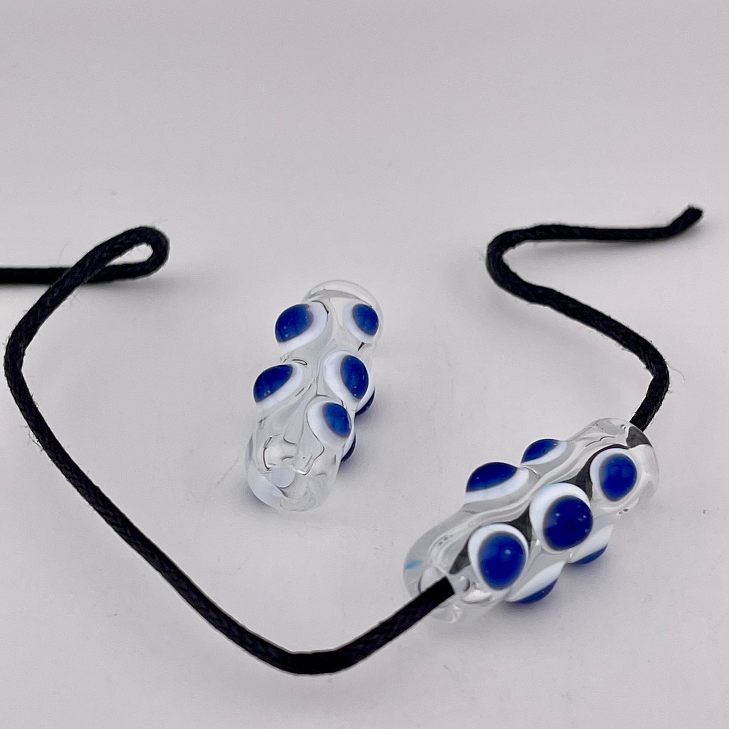 2 Clear Glass Barrel Bead with Blizzard Blue over White Marbles - JeffBeckerGlass.com