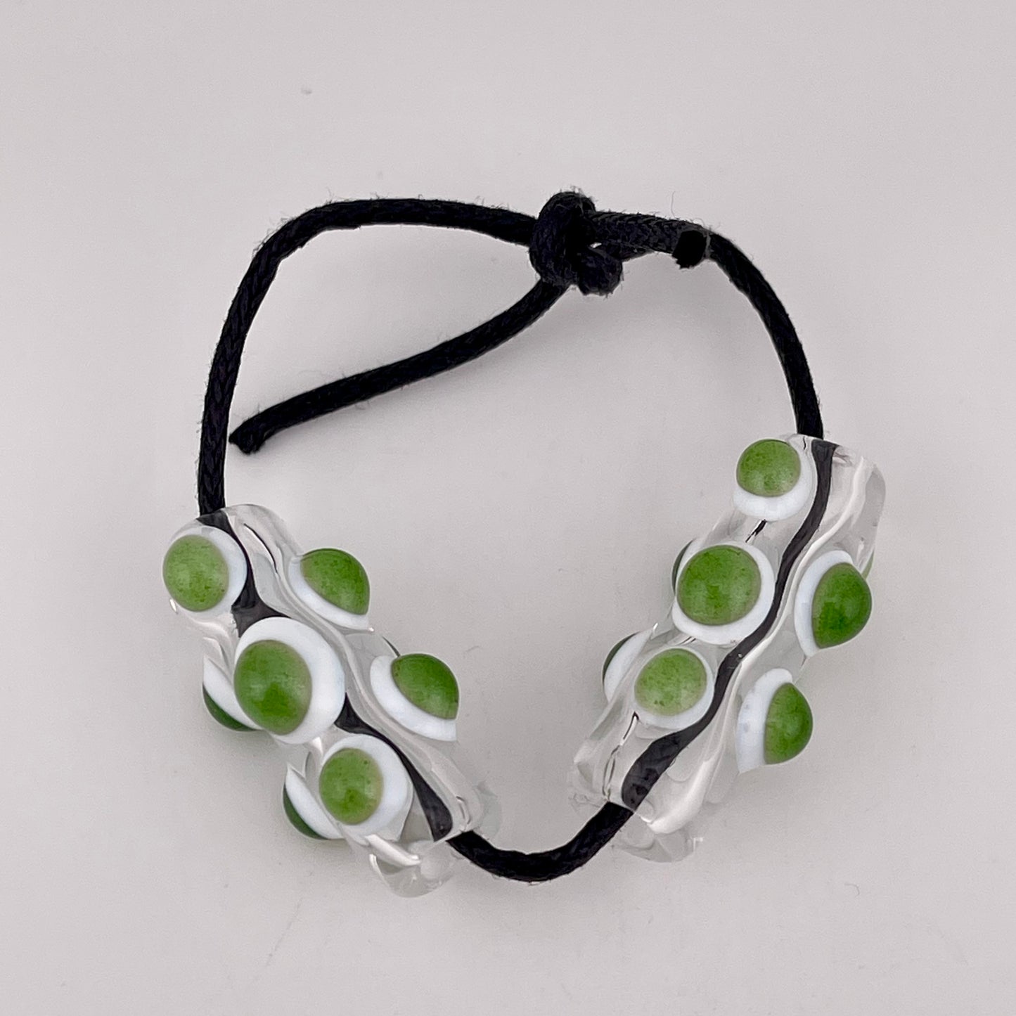 2 Clear Glass Barrel Bead with sparkly Green over White Marbles