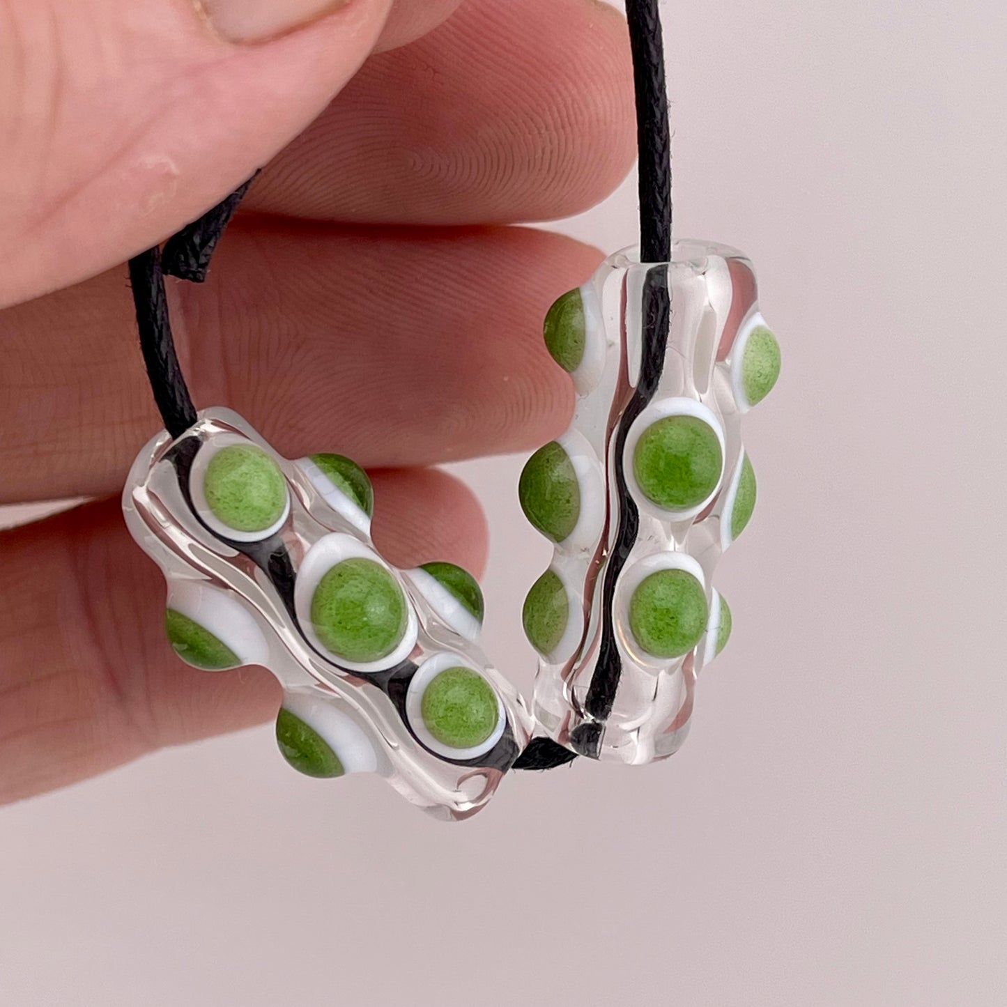 2 Clear Glass Barrel Bead with sparkly Green over White Marbles
