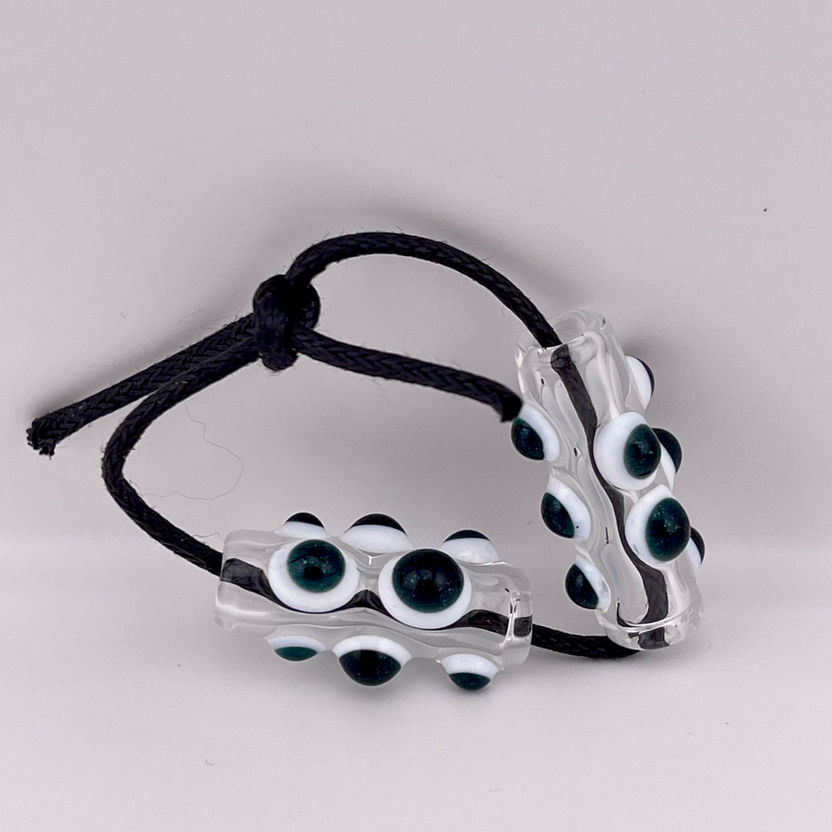 2 Clear Barrel Bead with Sparkly Blue over White accent marbles - JeffBeckerGlass.com