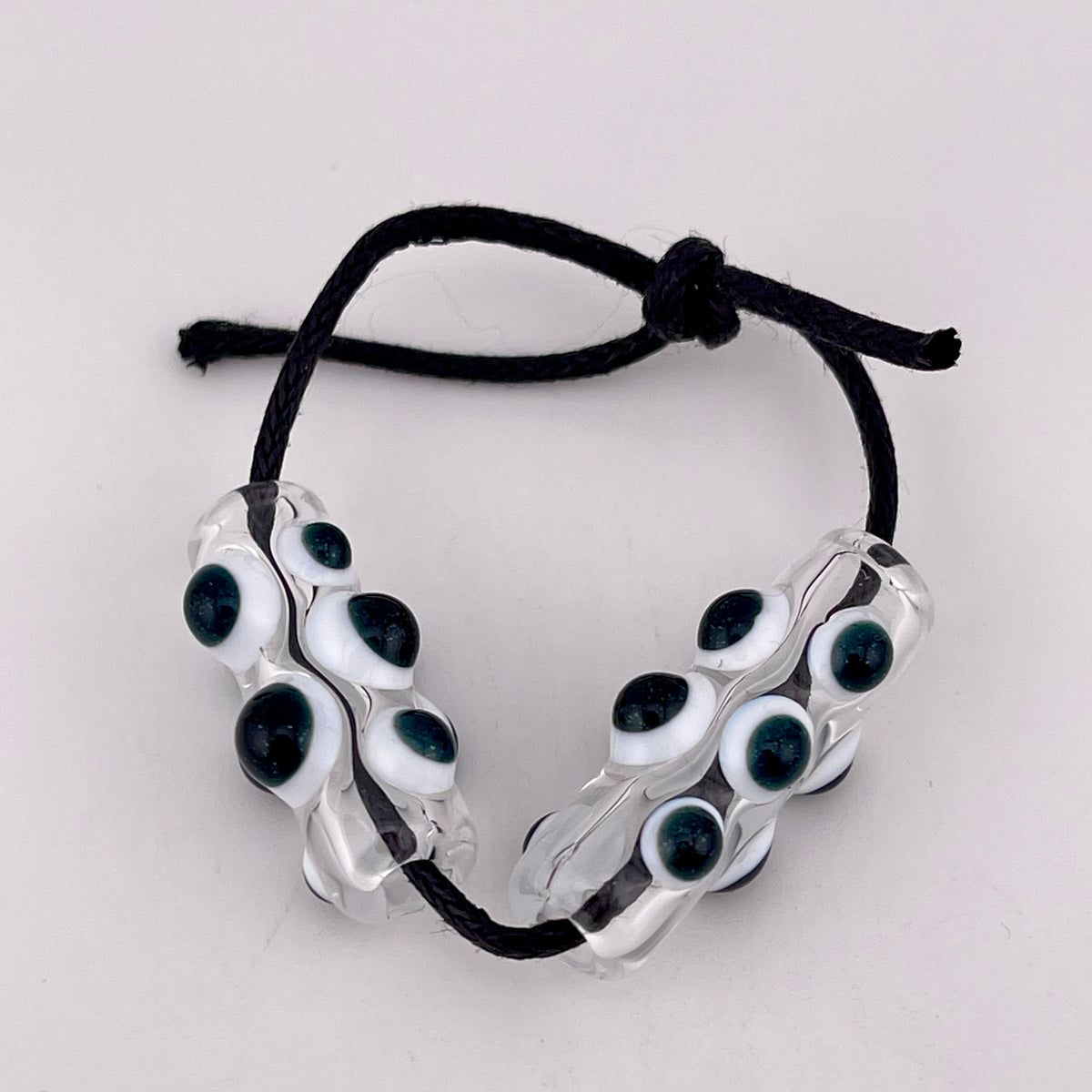 2 Clear Barrel Bead with Sparkly Blue over White accent marbles - JeffBeckerGlass.com
