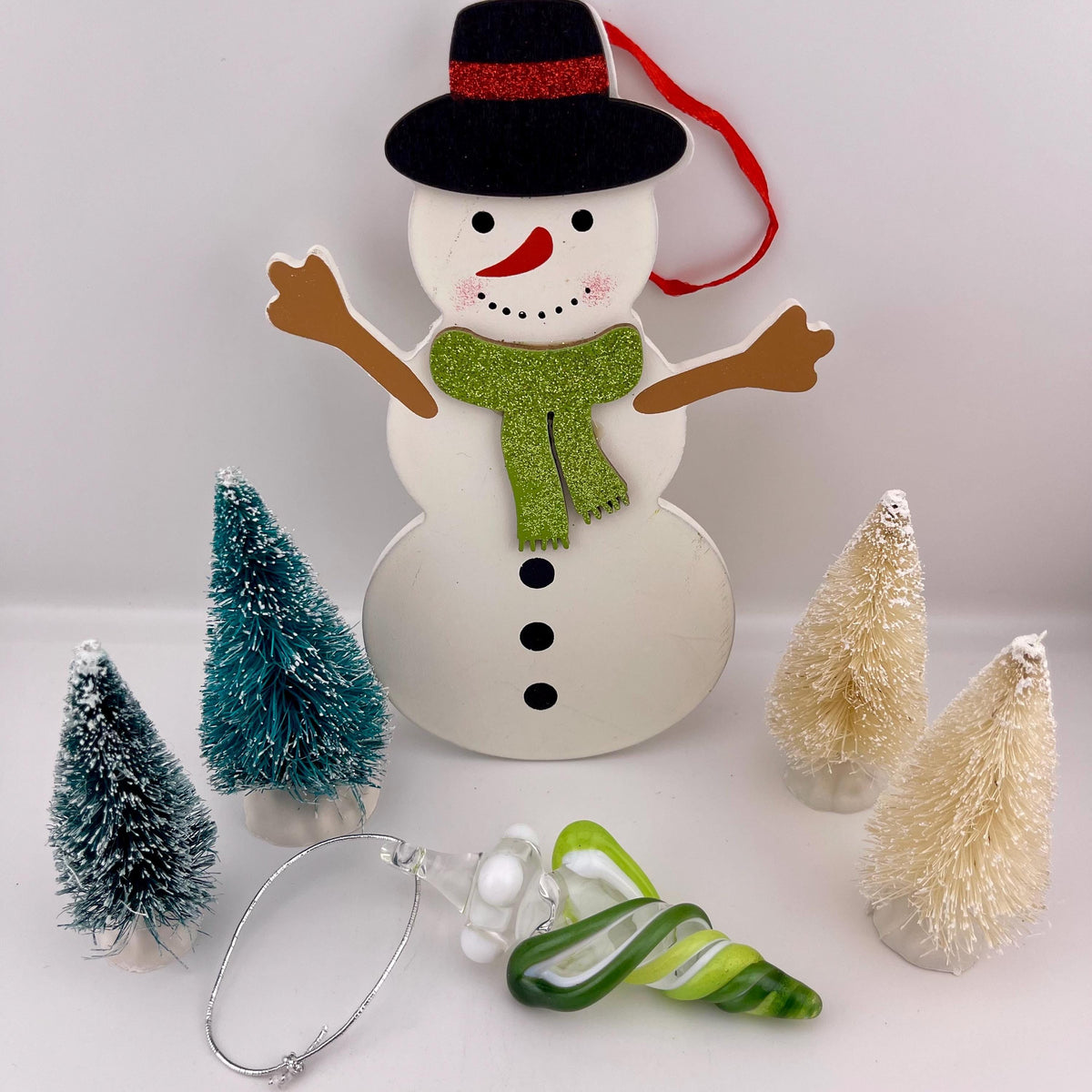 Mini Glass Icicle Ornament with Slymm Green and Sparkly green over Lotus White Color Twist - JeffBeckerGlass.com