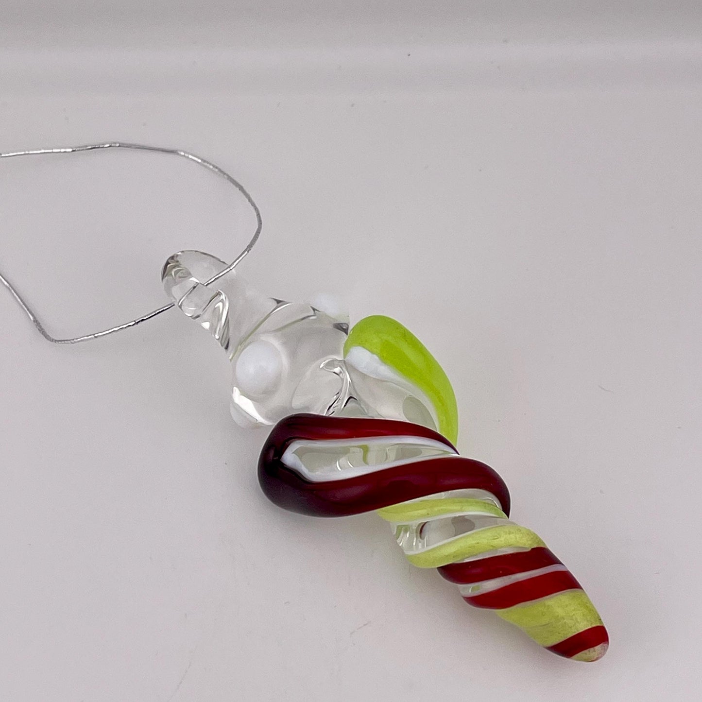 Mini Glass Icicle Ornament with Elvis Red and Green Slime over Lotus White Color Twister - JeffBeckerGlass.com