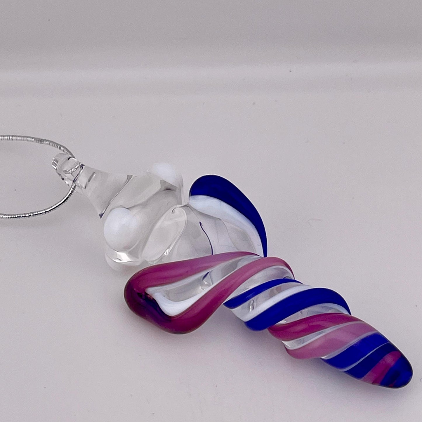 Mini Glass Icicle Ornament with Royal Jelly and Cobalt Blue over Lotus White Color Twist - JeffBeckerGlass.com