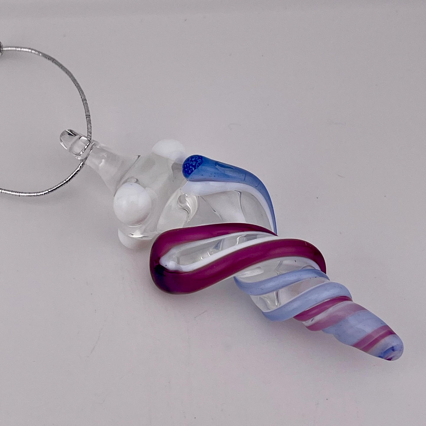 Mini Glass Icicle Ornament with Royal Jelly and Light Blue over Lotus White Color Twist - JeffBeckerGlass.com