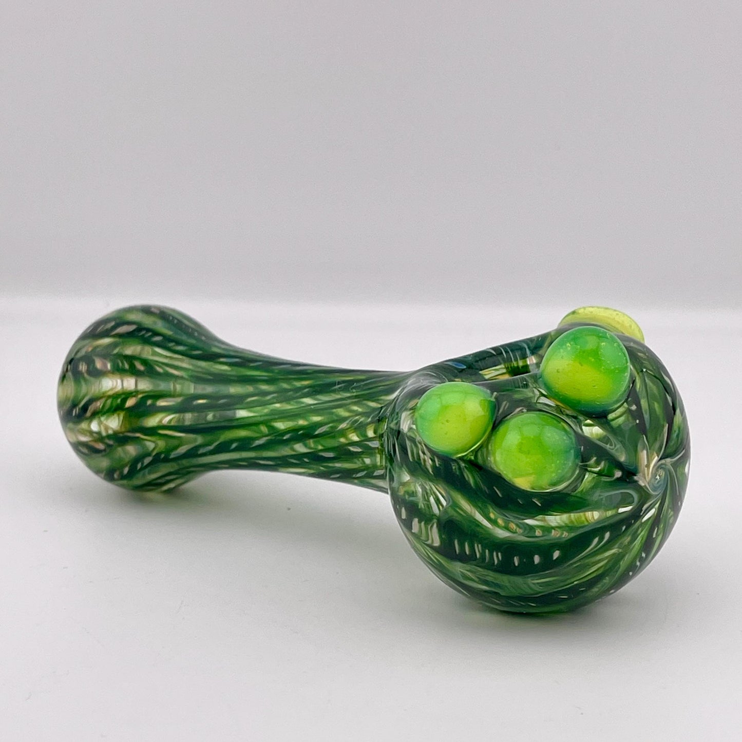 Wrap n Raked Green Silver Fumed Spoon Pipe with slime green marbles - JeffBeckerGlass.com