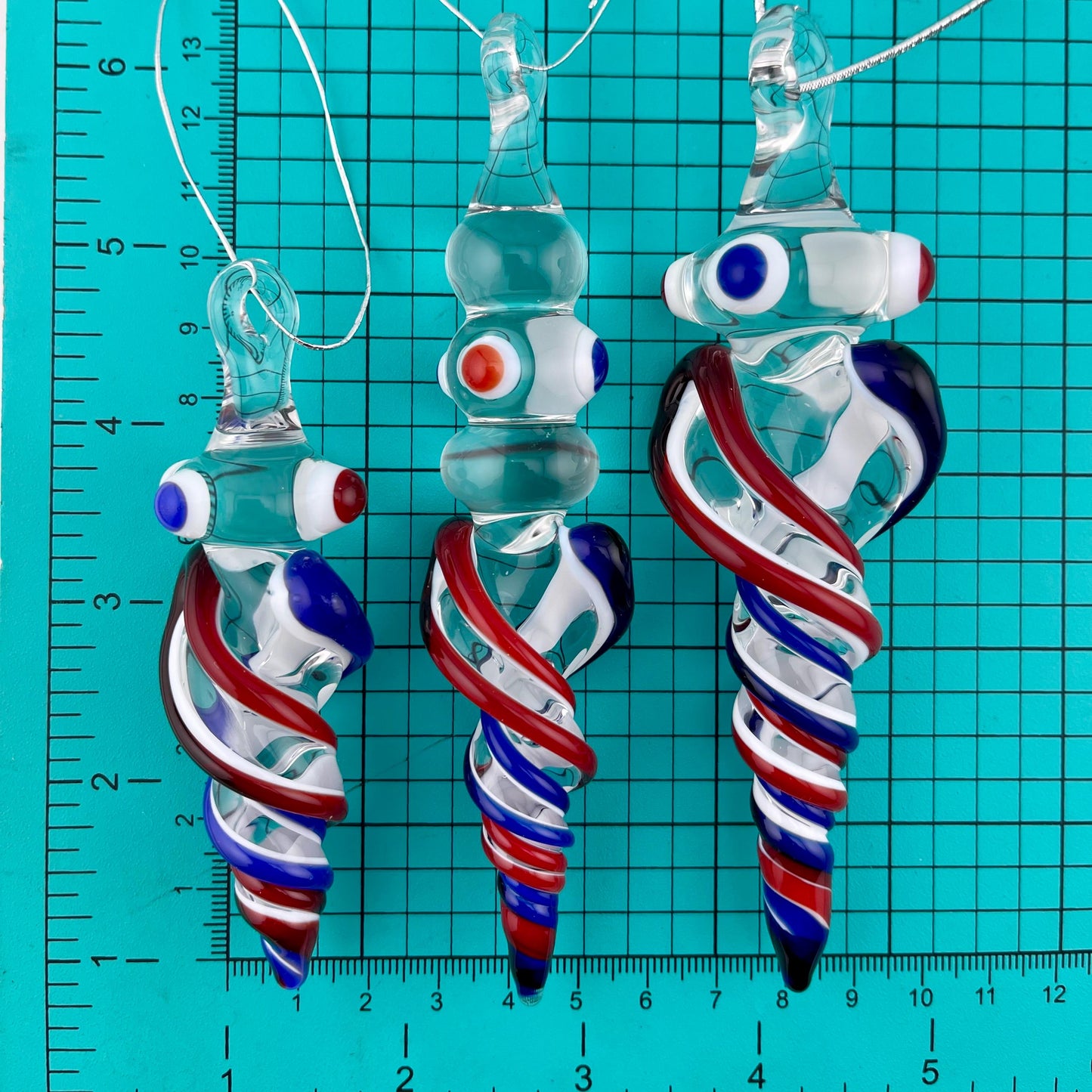 3 Pack of Elvis Red and Cobalt Blue over Lotus White Glass Icicle Ornament Designs “Holiday Special” - JeffBeckerGlass.com