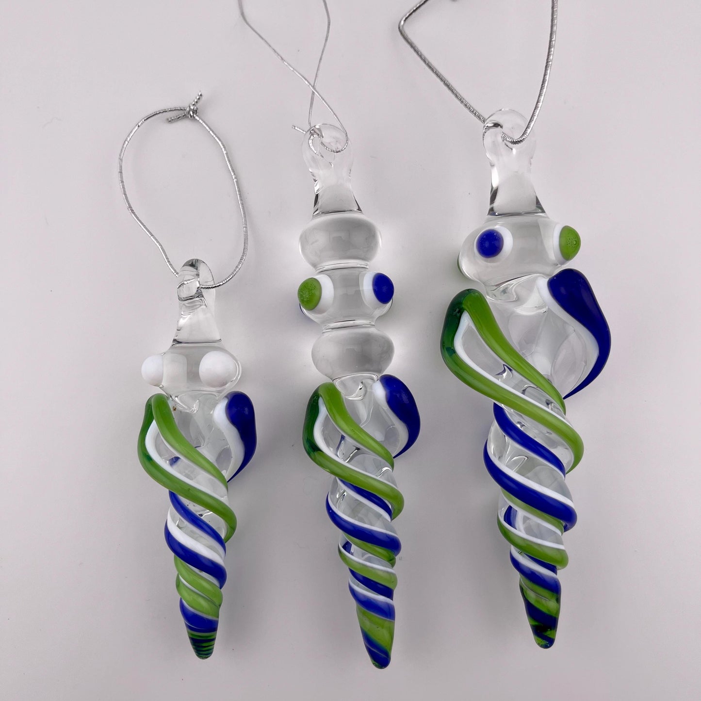 3 Pack of Sparkly Green and Cobalt Blue over Lotus White Glass Icicle Ornament Designs “Holiday Special” - JeffBeckerGlass.com