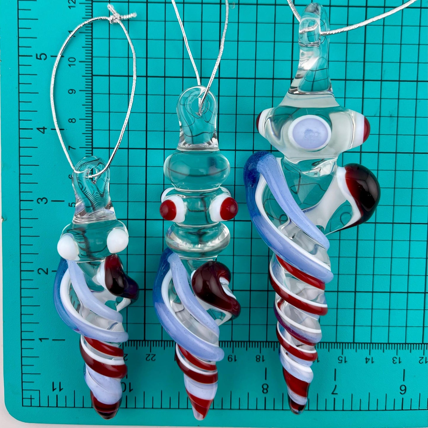 3 Pack of Elvis Red and Light Blue over Lotus White Glass Icicle Ornament Designs “Holiday Special” - JeffBeckerGlass.com